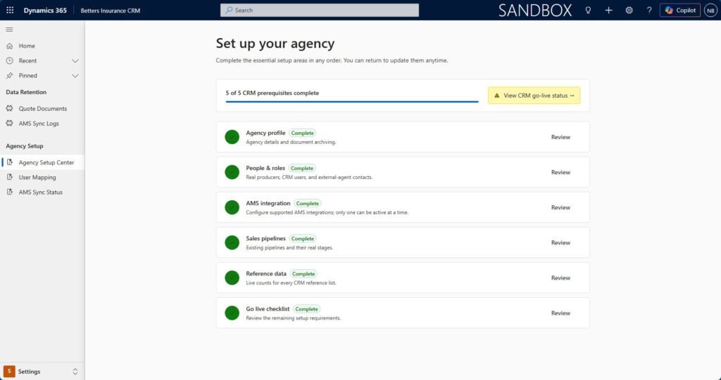 A guided agency setup screen in Dynamics 365 showing six setup areas with completion status and a go-live checklist